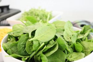 A close-up of fresh spinach leaves